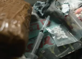 Three suspected drug dealers have been kicked out of a council house in Wokingham