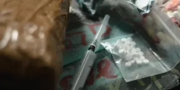 Three suspected drug dealers have been kicked out of a council house in Wokingham