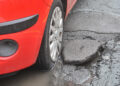 Cars damaged by Potholes