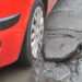 Cars damaged by Potholes