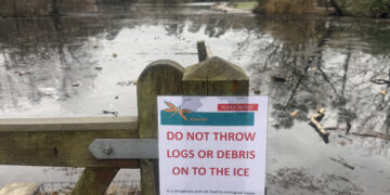 Logs On Frozen Lakes Warning sign