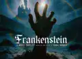 Hand reaching towards lightning with castle in background for Frankenstein play.