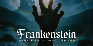 Hand reaching towards lightning with castle in background for Frankenstein play.